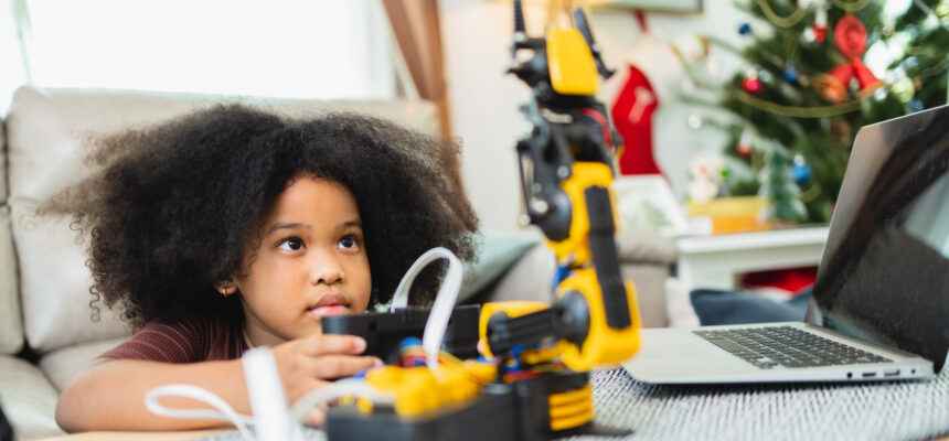 two african american girls learned robot arms with 2022 05 10 15 16 09 utc 860x400 1 11zon